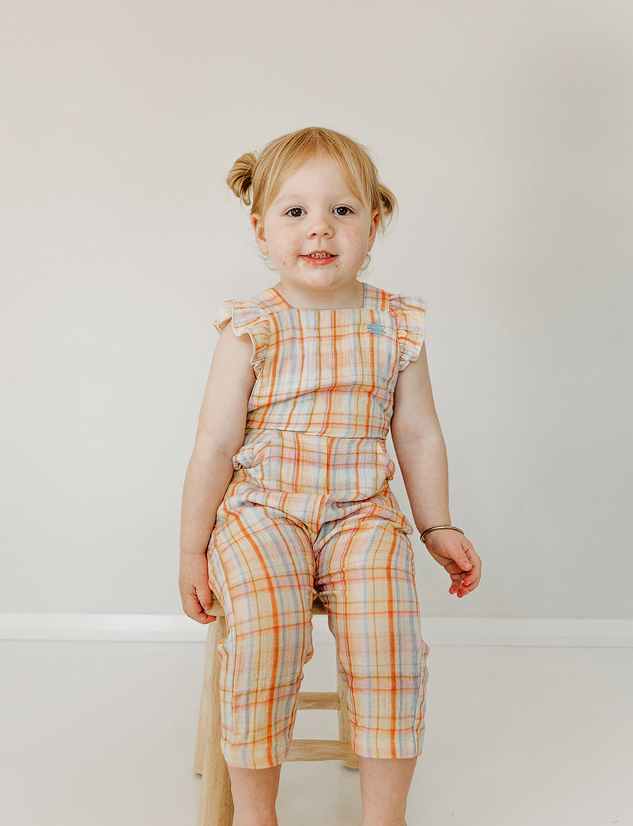 Kapow Kids Girls Rainbow Plaid Ruffle Dungarees | Rompers & Playsuits | Bon Bon Tresor