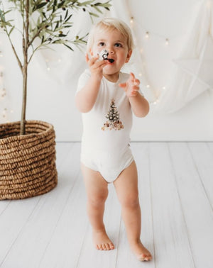 Child Of Mine Eggnog Trim Bodysuit - Glistening Tree | Rompers & Playsuits | Bon Bon Tresor