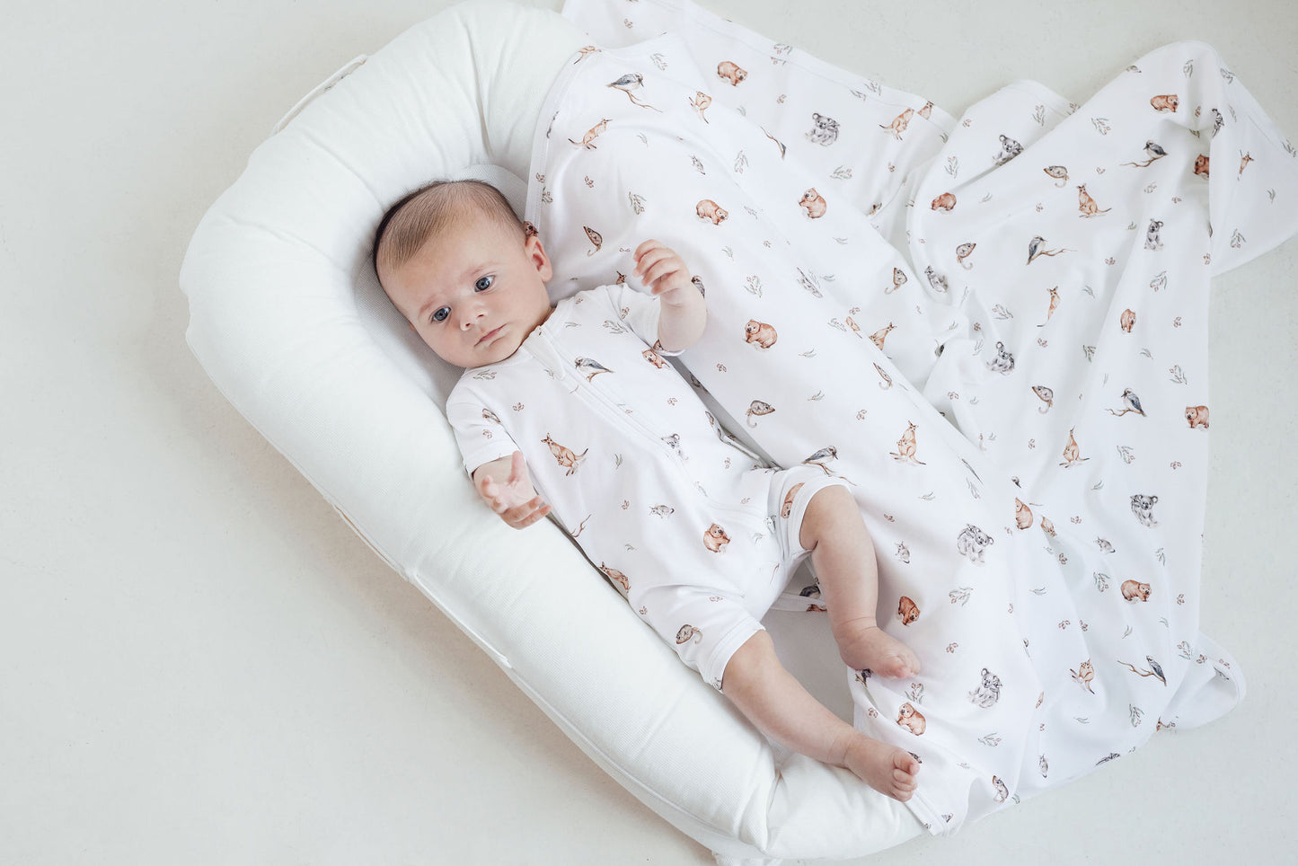 Aster and Oak Baby Boys Native Animals Zip Romper | Rompers & Playsuits | Bon Bon Tresor