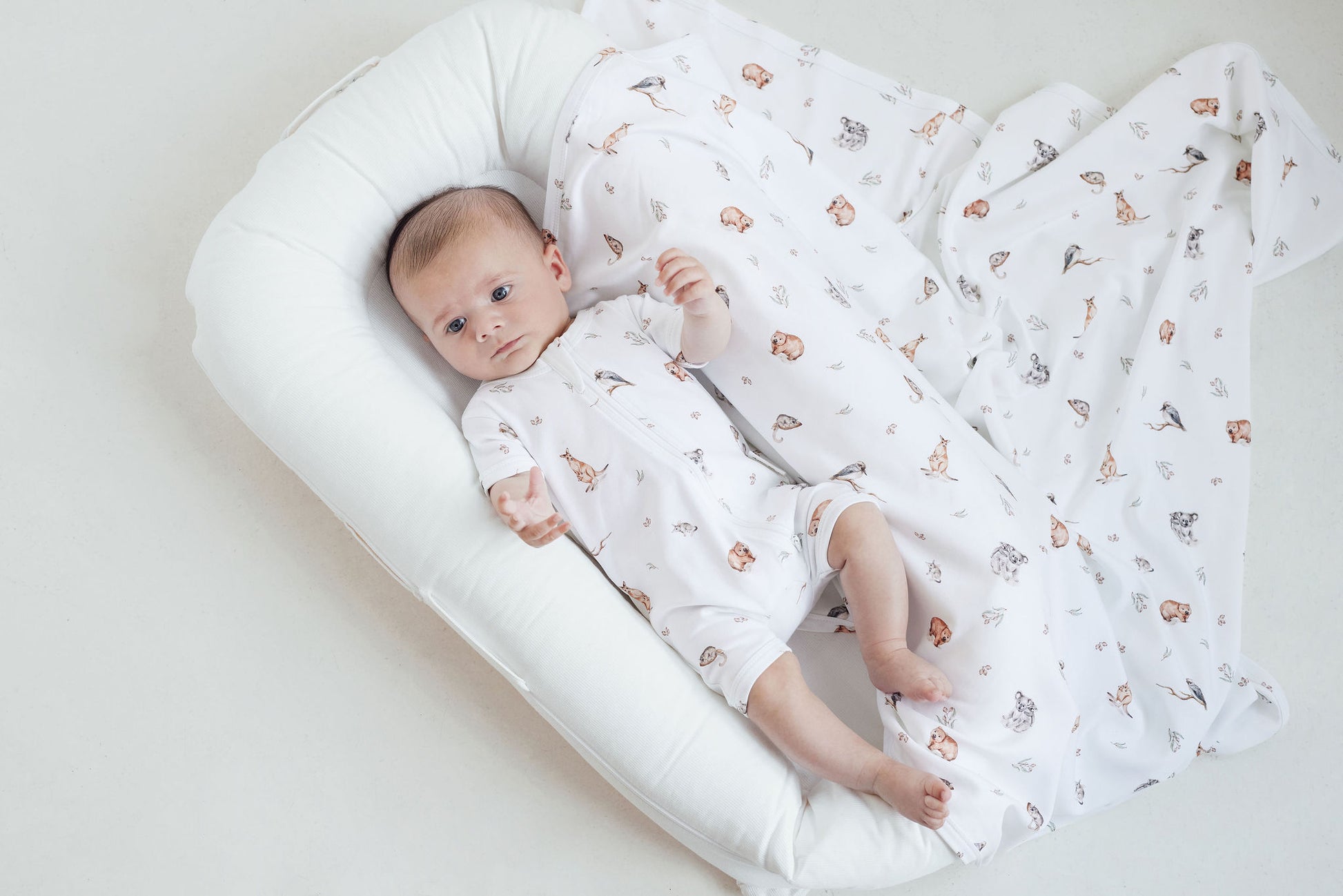 Aster and Oak Baby Boys Native Animals Zip Romper | Rompers & Playsuits | Bon Bon Tresor