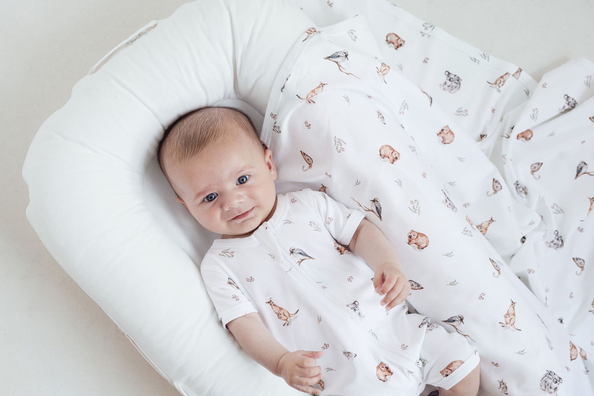 Aster and Oak Baby Boys Native Animals Zip Romper | Rompers & Playsuits | Bon Bon Tresor