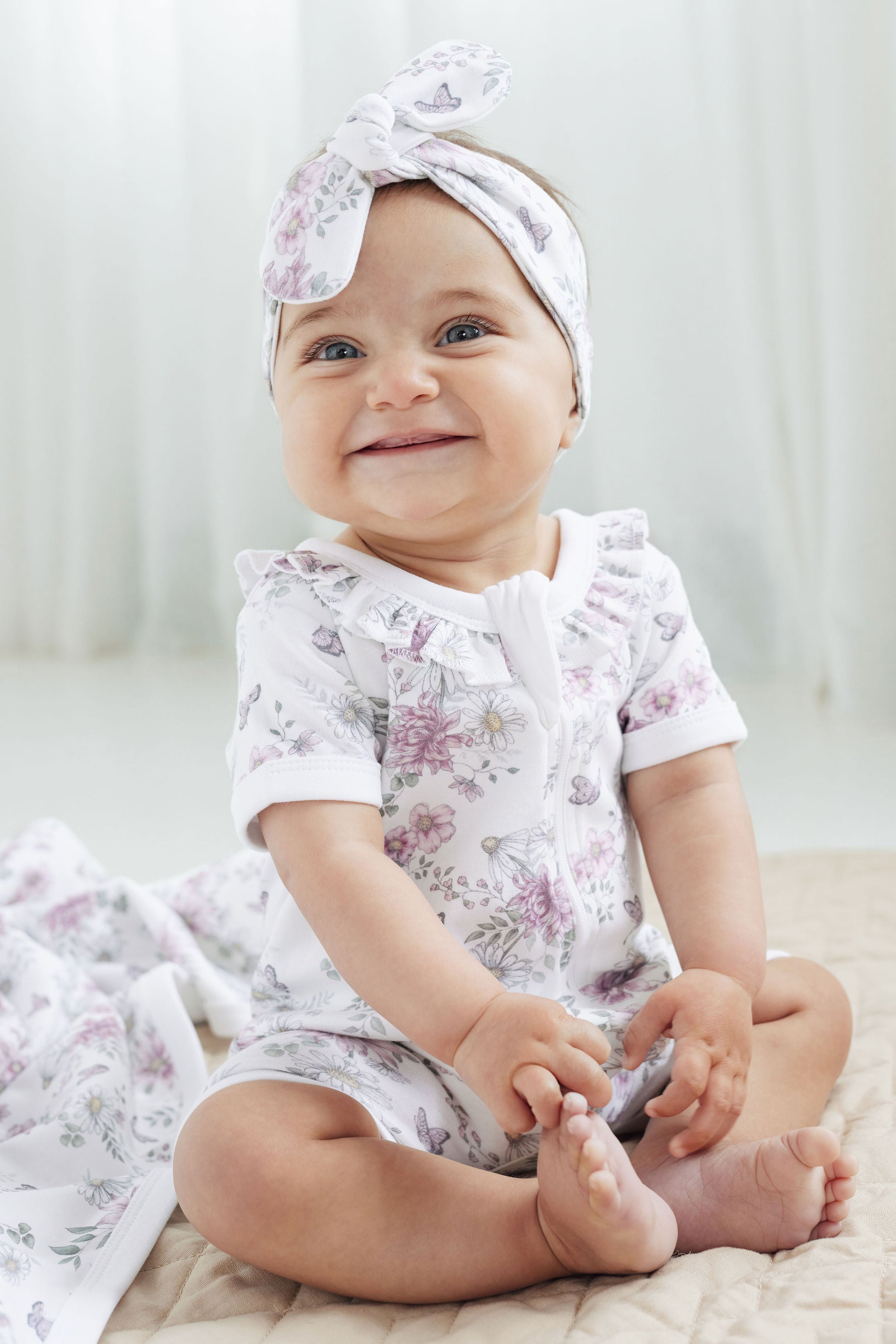 Aster and Oak Daisy Floral Zip Romper