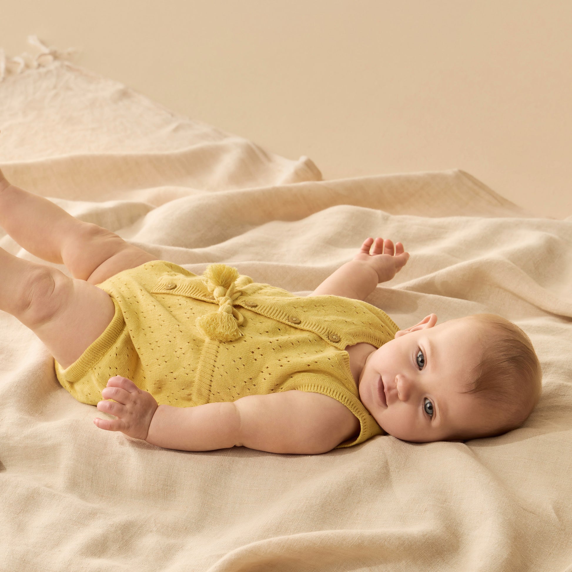 Wilson and Frenchy Sunny Sorbet Organic Knitted Tie Bodysuit | Rompers & Playsuits | Bon Bon Tresor